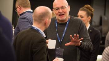 Two people speaking to each other