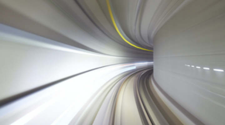 Blurry futuristic tunnel rounding corner