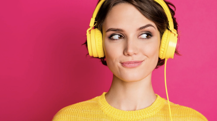 Woman listening to headphones