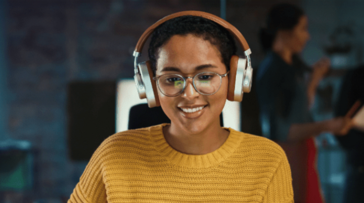 Woman listening to headphones