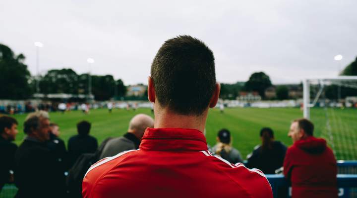 People watching a football match 