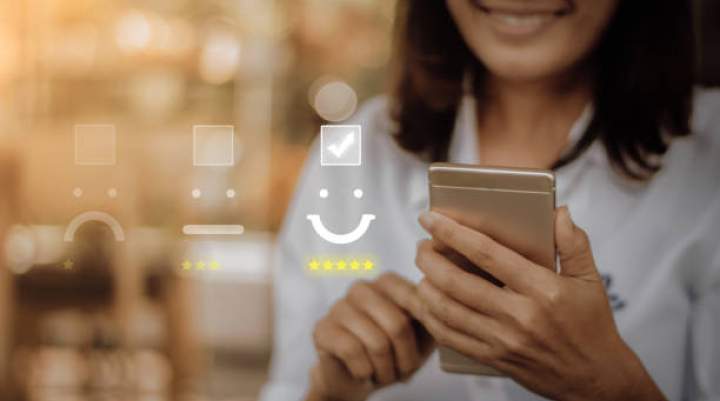 A woman looking at a mobile phone