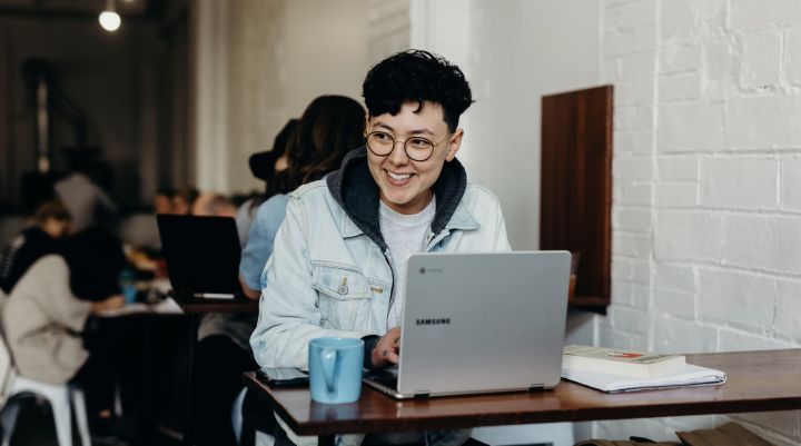 Person in cafe using computer