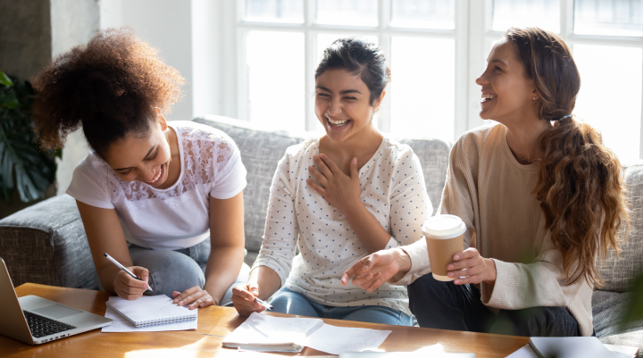 An image of three women having a conversation