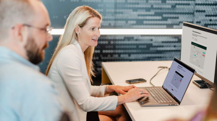 People sitting at a laptop 