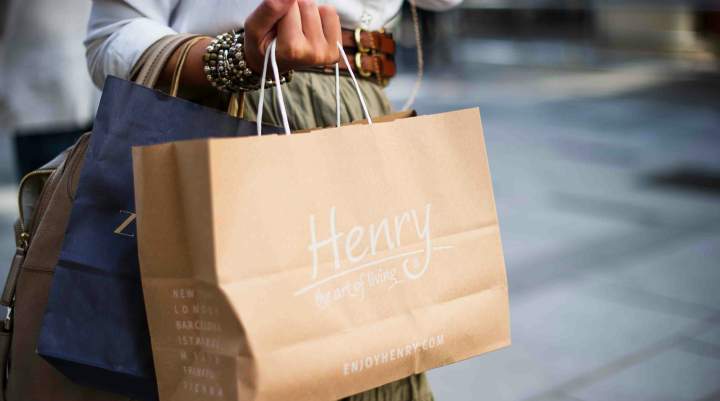 A woman carrying shopping bags