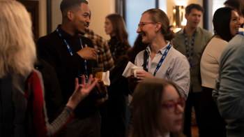 Two people chatting at an event