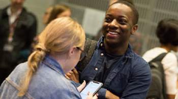 Stock image of two people smiling