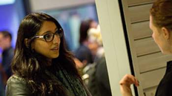Stock image of two women discussion something